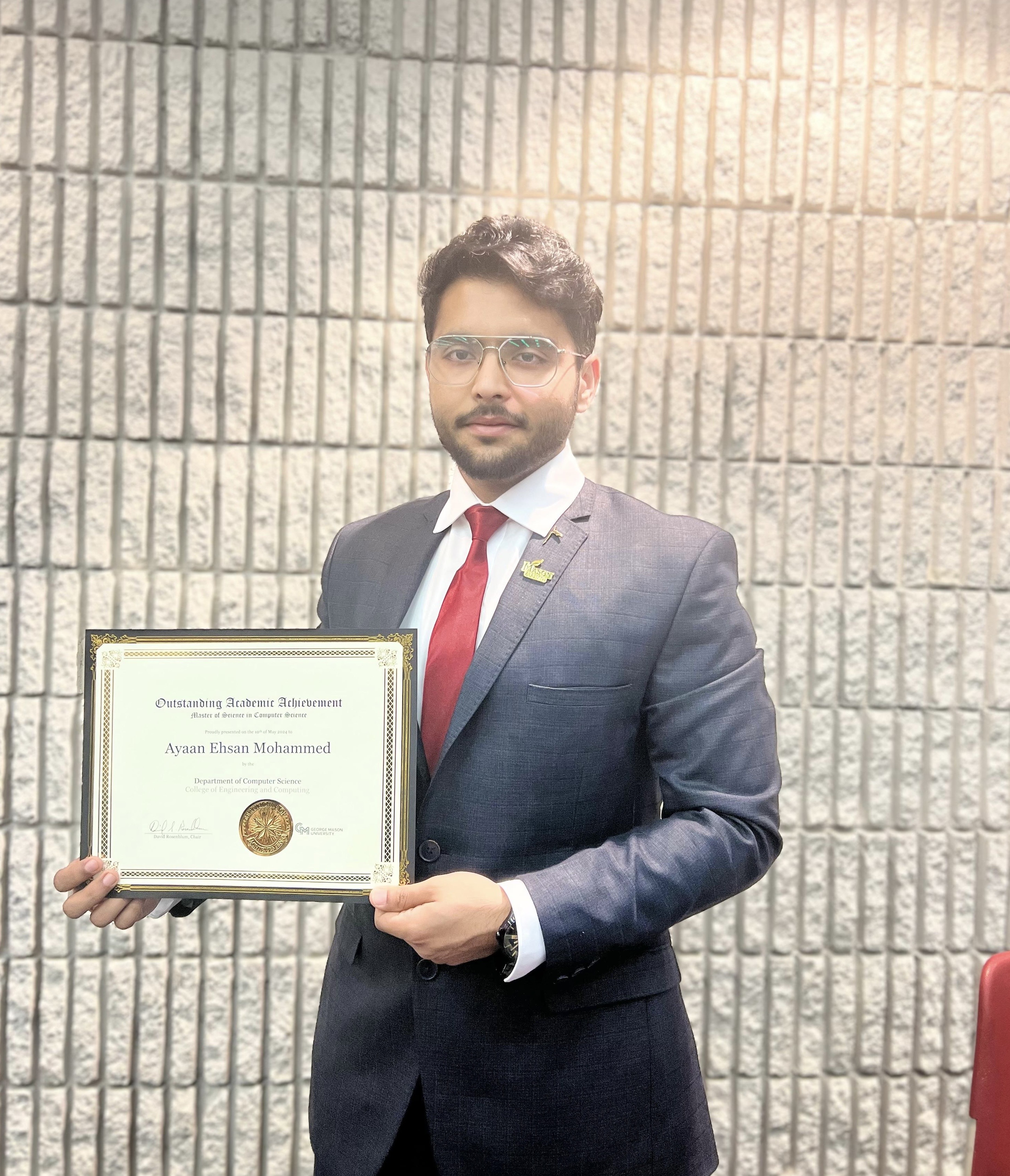 Ayaan Ehsan Mohammed receiving Outstanding Academic Achievement Award